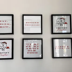 a variety of framed posters