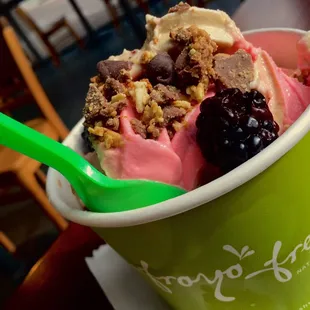 Red Velvet &amp; Coffee frozen yogurt with Reese&apos;s, blackberries, granola, &amp; chocolate chips. In the big cup ...........................Fro, Yo.