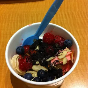 a bowl of fruit and yogurt