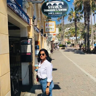 Sneha J.