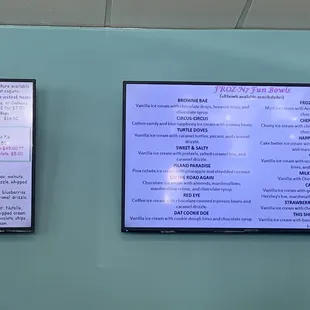 two menus on a wall