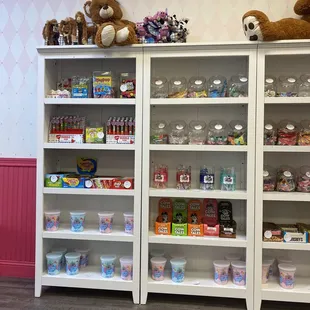 a shelf full of candy