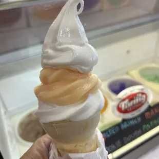 Yes that&apos;s Mango and creamy tart fro yo in a cone. To die for!!