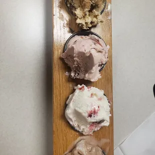 Ice cream flight! peanut butter fudge swirl, chocolate covered strawberries, raspberry truffle, hot chocolate
