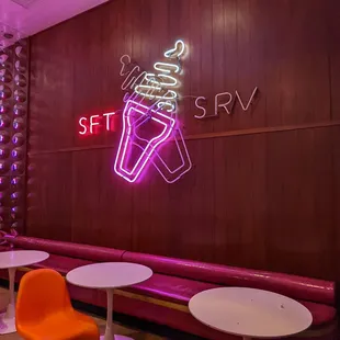 a neon sign in a restaurant