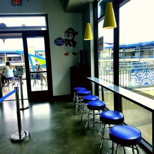 Indoor and outdoor seating, second floor of the circular food courtyard