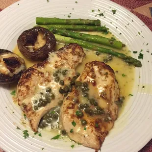 Lemon caper chicken- chicken was moist and flavorful. Sides of stuffed mushrooms and asparagus.