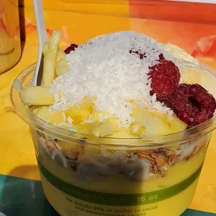 Bowl of the day:  Mahalo Mango w/  Coconut Flakes Pineapple &amp; Raspberries