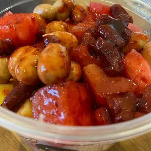Fruit cup with toppings with chamoy sauce