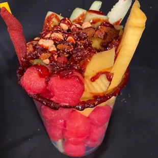 Fresh fruit serve daily with our famous chamoy