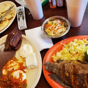 Fried fish, pupusas, breakfast