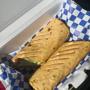 Wrapped with tomato basil flat bread/tortilla.