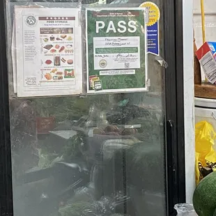 a glass door with a sign on it