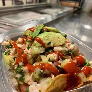 a salad in a plastic container