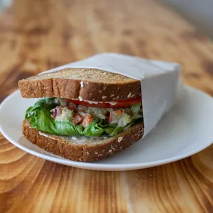 a sandwich on a white plate
