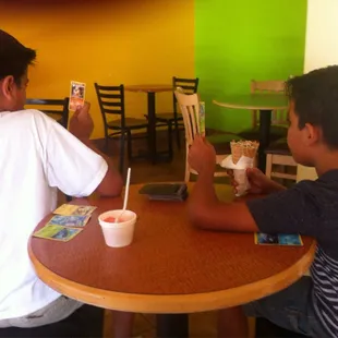 Pokemon game the old school way and icecream= happy kids