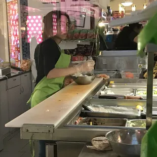 a woman preparing food