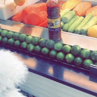 The guy putting the chamoy I asked him to not put in my fruit.