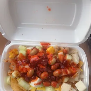 Tostilocos! First time trying it nd it was delicious, personally wouldnt get the pig skin though