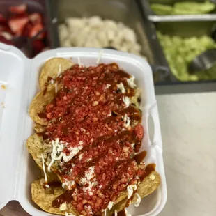 TostiElote with Hot Cheeto Powder on Top! Roasted Corn, Mayo, Butter &amp; Cheese.