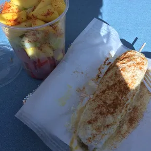 Fruit cup with chili and lime added from their condiment table and Corn (elote) with everything on it-yum!