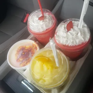 Strawberry smoothie, pineapple slush, and esquite
