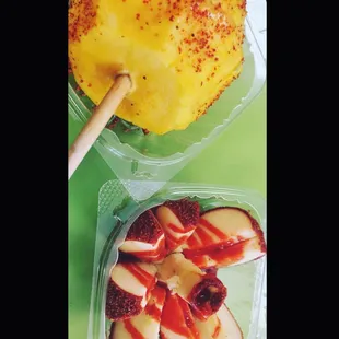 a variety of fruit in plastic containers