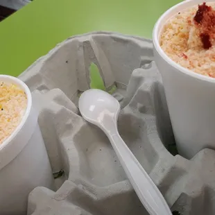 two cups of coffee and a spoon