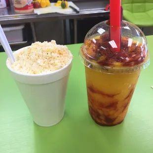 a plastic cup with a straw next to a plastic cup with rice