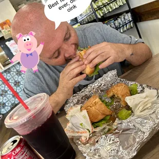 a man eating a sandwich
