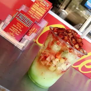 Cucumber Piña with lime and spices. So delicious!!