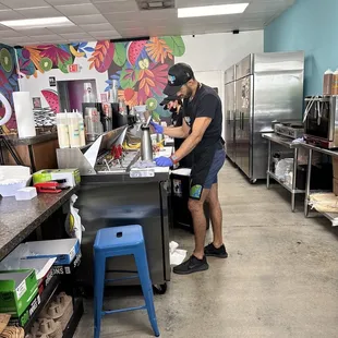 Preparing strawberries &amp; Cream