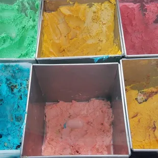 a variety of colored ice creams