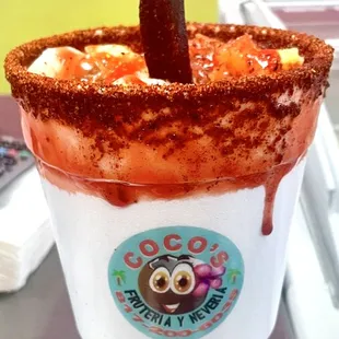 a drink with a stick sticking out of it