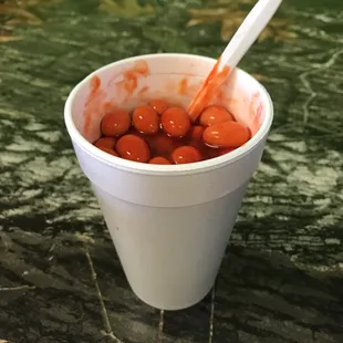 Japanese peanuts with chamoy, valentino hot sauce, fresh squeezed lemon.
