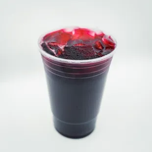 a plastic cup filled with fruit