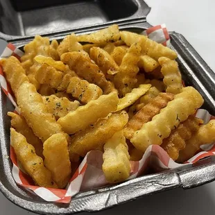 Perfectly cooked seasoned fries.