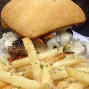 Hamburger with queso, bacon and Parmesan fries. Yum!