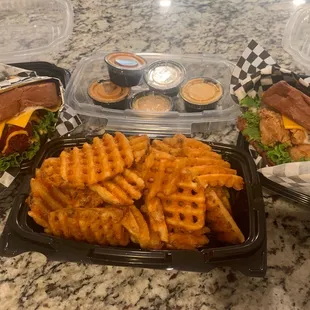 Flaming sandwich, large waffle fries, garlic sandwich