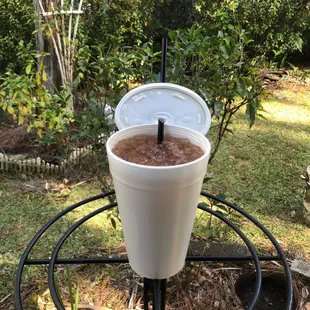 a drink in a plastic cup