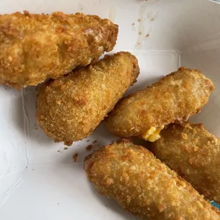 Cheesy Jalapeños- tastes like nacho cheese with Jalapeño pieces that are deep fried.