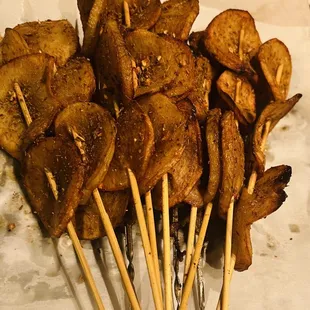 a bunch of skewered food