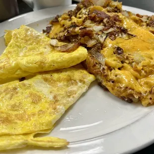 an omelet with bacon and cheese