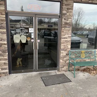 Front entrance with hours