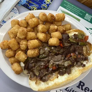 Philly cheesesteak and Tater Tots
