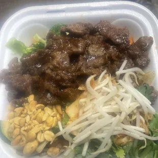 Korean BBQ Beef with double protein and no rice. Tons of delicious veggies are hidden under all the beef and sprouts/cilantro.