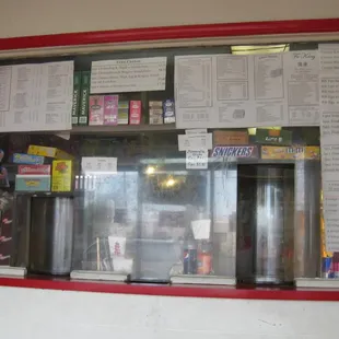 the plexiglass partition between the staff and customers