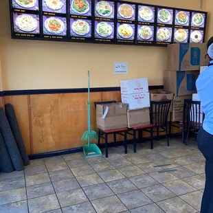 a woman standing in a restaurant