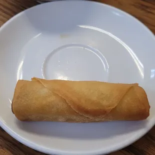 A pasty vegetable spring roll.