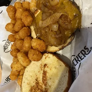 Pretzel burger with tater tots